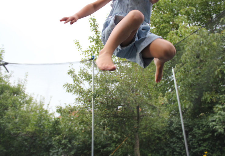 Young person jumping in the air